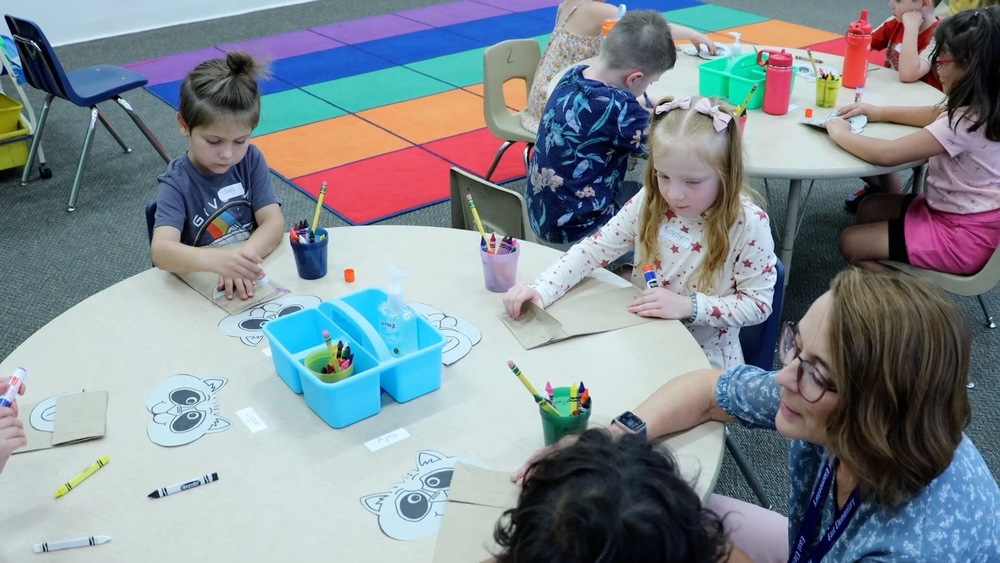 kindergarten students work on an art project