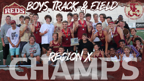 Boys track team with trophy