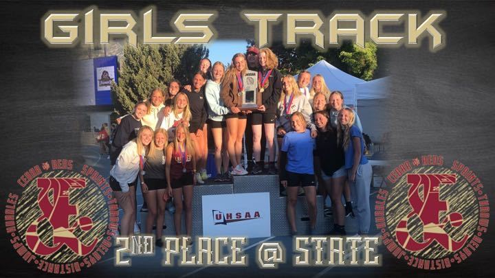 Girls track team a top the podium with trophy