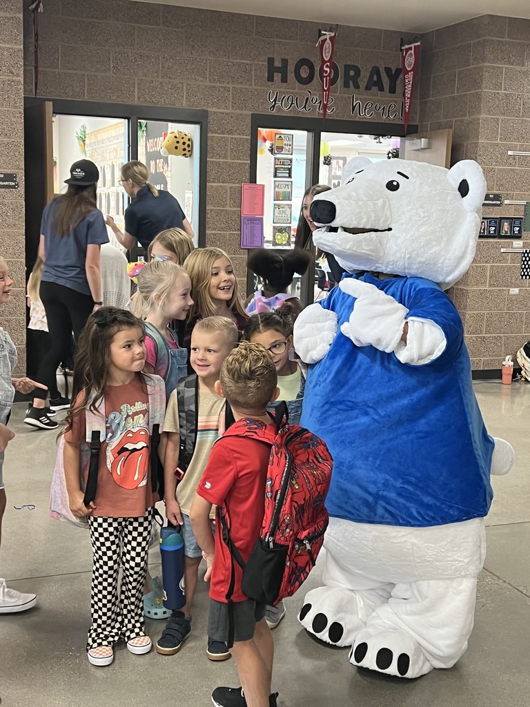 Iceman, North's polar bear mascot, welcomes kindergarteners and other students to school.
