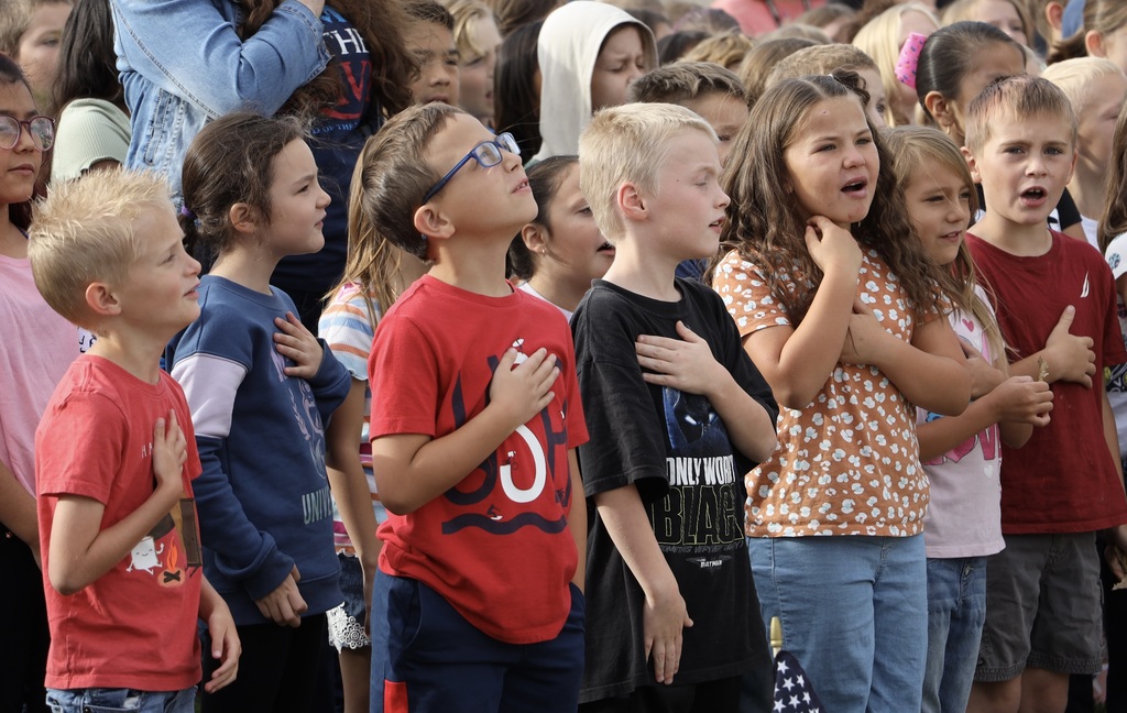 Students participate in the Pledge of Allegiance