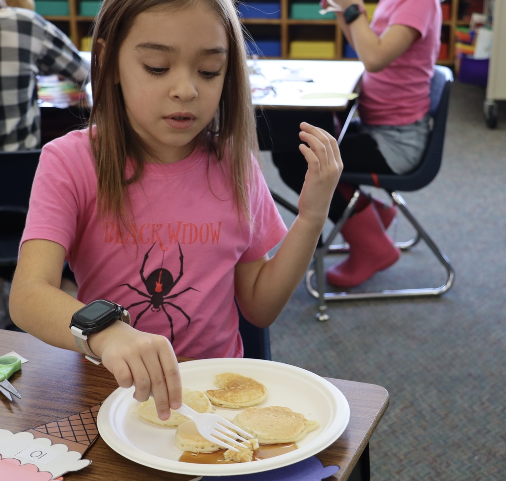 A student enjoys four of the 100 pancakes for 100 days.