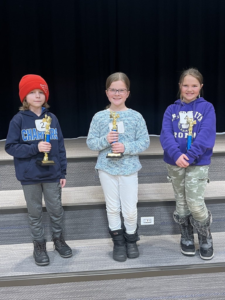 The top three contestants in the Spelling Bee.